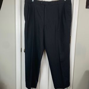 Black pinstriped mens dress pants 100% wool. Pleats in the front.